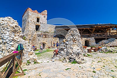 Cachtice, Slovakia - 4.7.2020: Tourists are visiting ruin of medieval castle Cachtice. Famous castle known from legend about blood Editorial Stock Photo