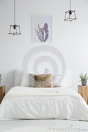 King-size bed with brown pillow Stock Photo