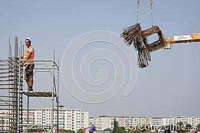 Cadastral engineer conducting land management expertise on a con Editorial Stock Photo