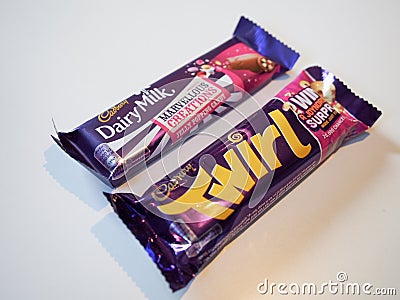 Cadbury dairy milk chocolate and Twirl. Editorial Stock Photo