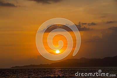 Sunset in Candi Dasa Beach Stock Photo