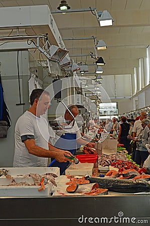 Fishmongers at Cadiz fish Market Editorial Stock Photo
