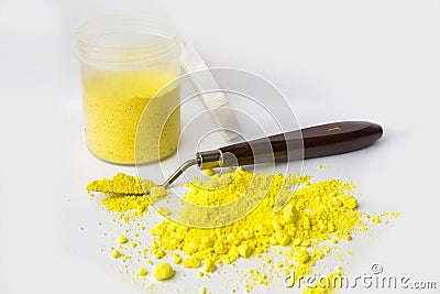 Cadmium Yellow pigment on a white background Stock Photo