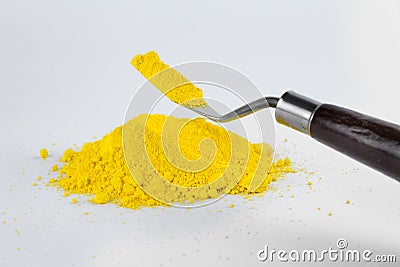 Cadmium Yellow pigment on a white background Stock Photo