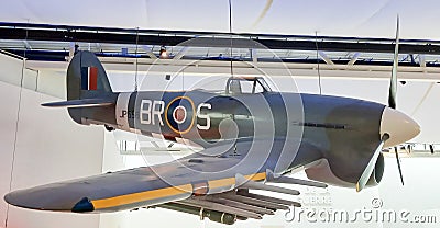 WWII military plane hanging in the museum hall second World War in Memorial de Caen Editorial Stock Photo