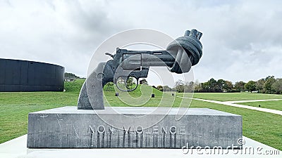 Caen replica of Carl Fredrik ReuterswÃ¤rd Non-violence statue front of the Caen Editorial Stock Photo