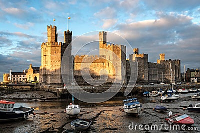 Caernarfon Castle in North Wales at sunset Editorial Stock Photo