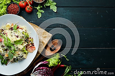 Caesar salad with bacon. Food. Top view. Stock Photo