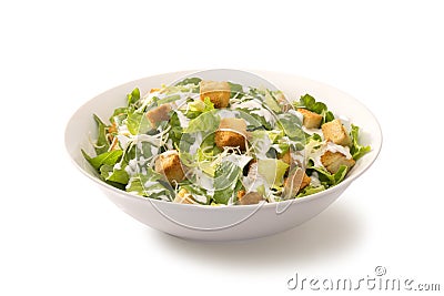 Caesar salad in a white plate Stock Photo