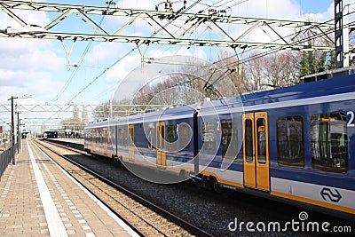 CAF Civity train at the trainstation of Den Haag Laan van NOI i Editorial Stock Photo