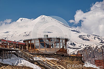 Cafe AI on mount Cheget. In the background, mount Elbrus. Editorial Stock Photo