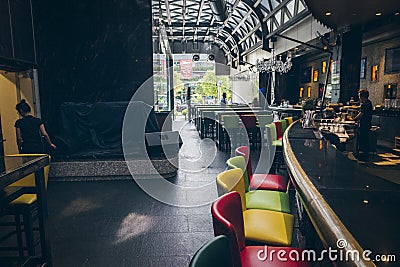 Cafe with colorful chairs, city of Ho Chi Minh City Vietnam Editorial Stock Photo