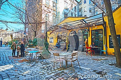 Cafe in court of Hundertwasser museum, Vienna, Austria Editorial Stock Photo