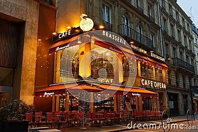 Cafe Opera is traditional French restaurant located at Auber street , just a stone's throw Opera Garnier palacein Editorial Stock Photo