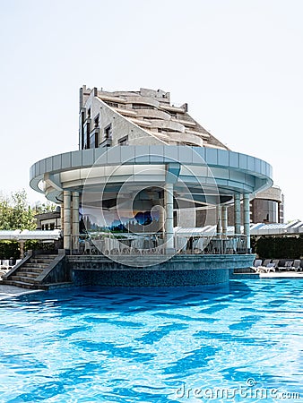 cafe and outdoor pool in Multi Grand Pharaon Hotel Editorial Stock Photo