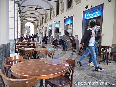 Cafe and restaurants turn back to business only on sidewalk after lockdown Editorial Stock Photo