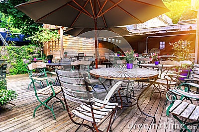 Cafe terrace in small European city Stock Photo