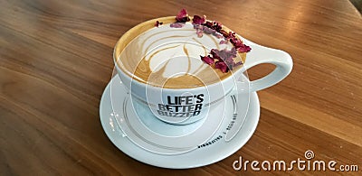 Caffe Latte with Rose Petals Editorial Stock Photo
