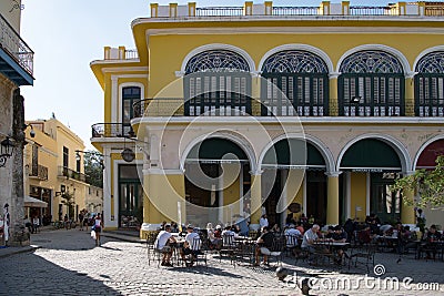 Cafe on Plaza Vieja and Calle Mercaderes in Havana, Cuba Editorial Stock Photo