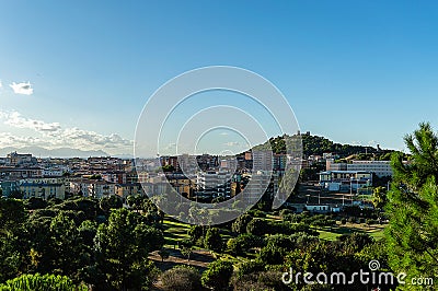 Aerial cityscape medieval Castle on a hill with modern city Stock Photo