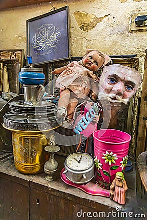 Doll and mask for sale at a shop in Cairo Editorial Stock Photo