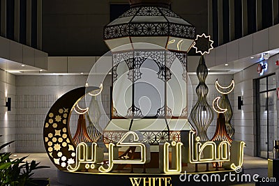 Cairo, Egypt, April 23 2023: festive decorations of Islamic Ramadan fasting month in Egyptian streets at night of stars, crescent Editorial Stock Photo