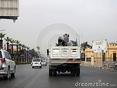 Cairo, Egypt, April 8 2023: Maintenance lift truck with a lifting mechanical equipped crane with a cable for lifting heavy objects Editorial Stock Photo