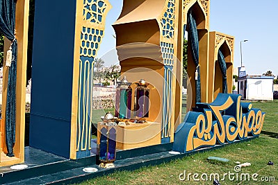 A side view of Ramadan festive decorations in the street, Islamic gates with curtains and Arabic lamps and lanterns Editorial Stock Photo