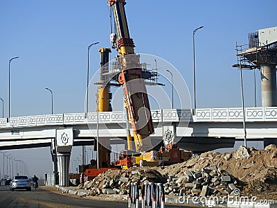 Cairo, Egypt, February 16 2023: Construction site of new Cairo monorail overhead transportation system that is still under Editorial Stock Photo