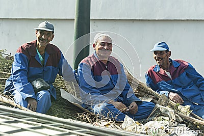 Illegal use of cargo transport to transport people. Garbage collectors in Cairo. Editorial Stock Photo