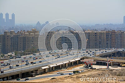 Aerial view of Cairo, Egypt from The Mokattam mountain and hills showing multiple buildings, streets, traffic Editorial Stock Photo