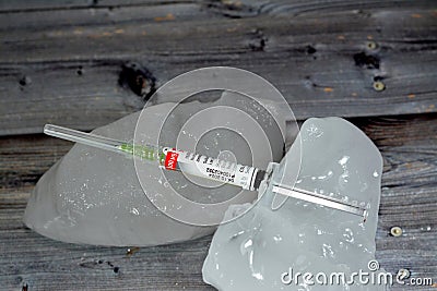 Human anti-D (Rh) immunoglobulin Rhophylac 300 Î¼g micrograms 1500 IU for IV or IM injection on ice for Stock Photo