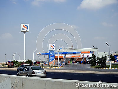 OLA Energy gas and oil station previously Oilibya gas station with a blue cloudy sky, a petrol gas station of OLA energy group Editorial Stock Photo