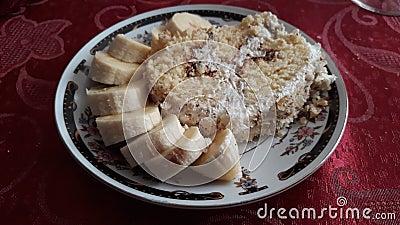 Cake with bannana on plate Stock Photo