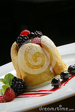 Cake with berries on a white plate Stock Photo