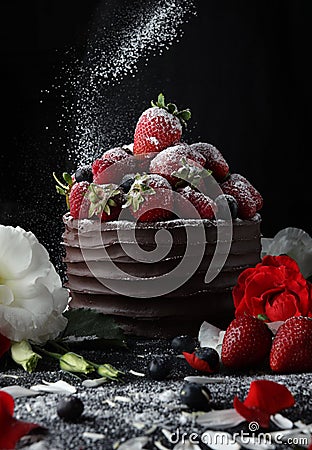 Cake with chocolate decorating with strawberry and raspberry Stock Photo