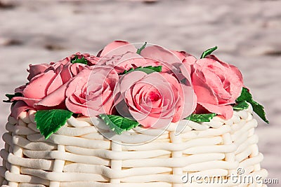 Cake in the form of a basket of roses Stock Photo