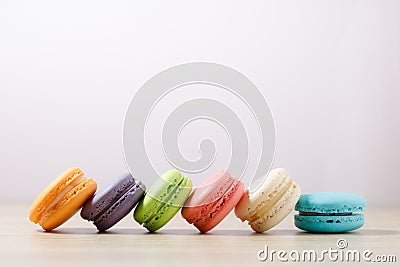 Cake macaron or macaroons on pastel background with copy space, Sweet dessert Stock Photo