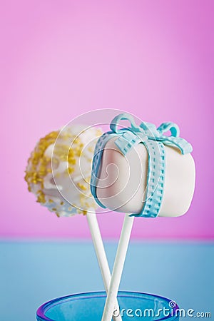 Cake pops as a gift with a candle Stock Photo