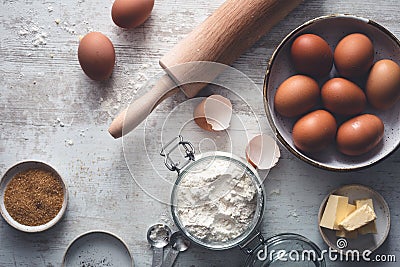 Cake Preparation with Eggs, Flour, Sugar, Butter Stock Photo