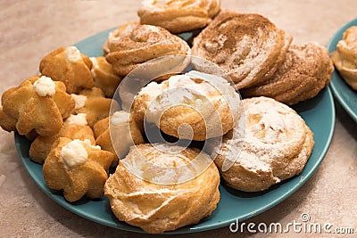 Cake profiteroles and Shu on a platter Stock Photo