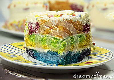 The cake, Rainbow Cake. Rainbow cake layers. Slice of Birthday Cake Stock Photo