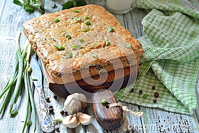 Cake with red rice and meat on the table Stock Photo