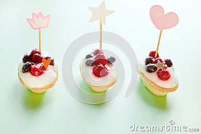 mini cakes with berries and cottage. party decoration with hearts. Valentine& x27;s Day gift for holiday Stock Photo