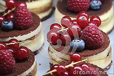 Cakes with cream and berries Stock Photo