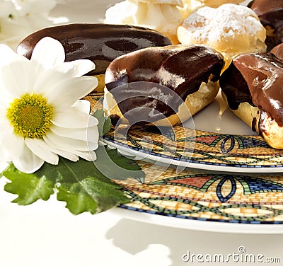 Cakes - cream puffs and eclairs Stock Photo