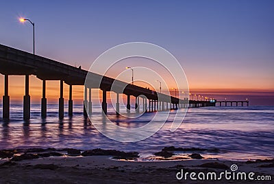 Pier at Ocean Beach in San Diego, California at Sunset Stock Photo