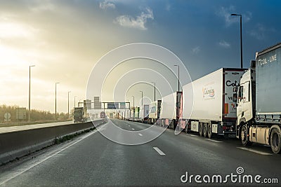 As brexit approaches, lines of trucks at the entrance to the Channel Tunnel Editorial Stock Photo