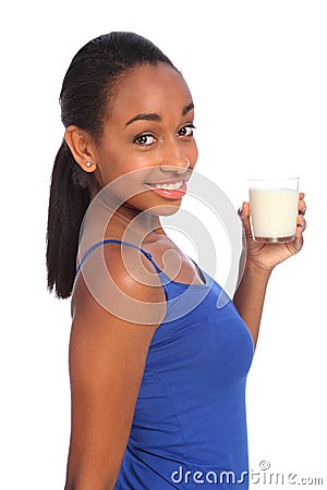 Calcium drink for African American girl with milk Stock Photo