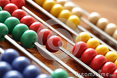 Calculating on an abacus Stock Photo